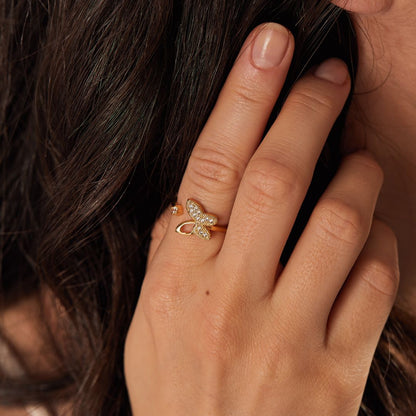 Diamond Studded Butterfly Adjustable Ring worn by a model in her right index finger